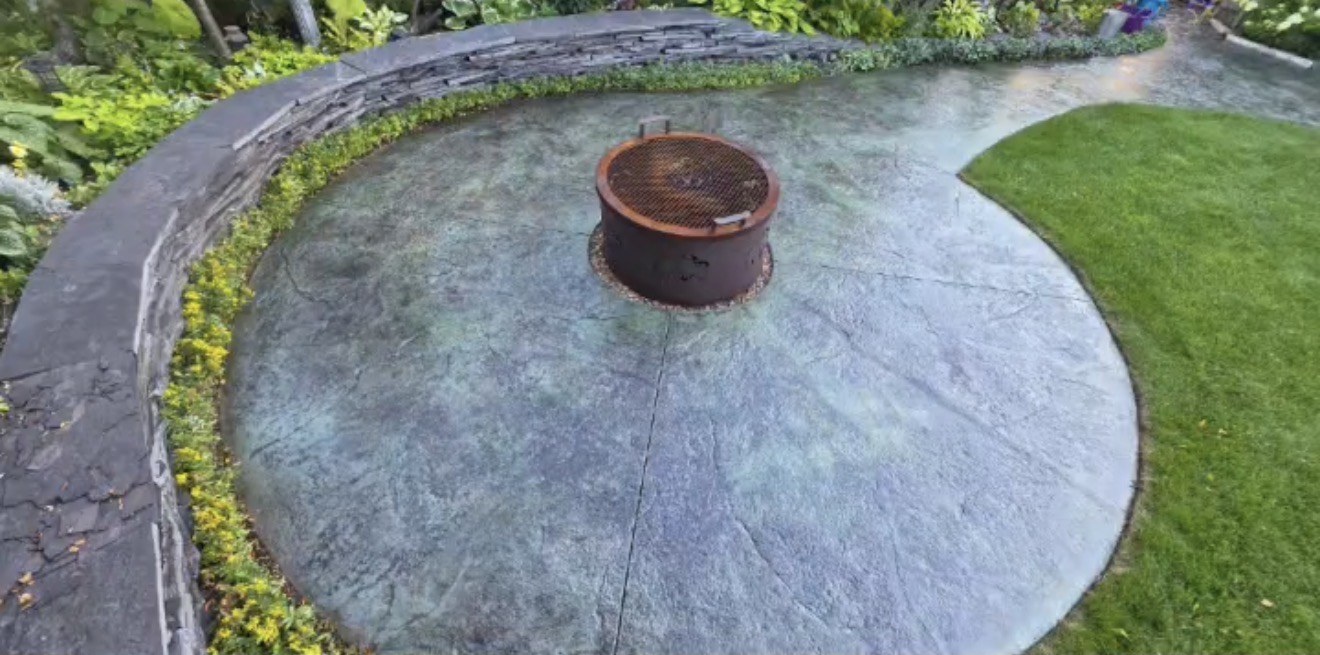 The fire pit patio after resealing with an even, colour-enhanced finish